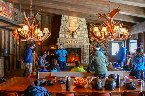 Keep skiing, then have a beer at the cabin with your friends